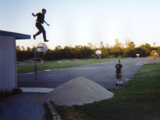 This is Ben jumping off the building at Boulder Creek Middle School by where we live into a pile of dirt