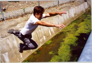 This is me jumping across a canal to grab onto a chainlink fence. I barely made it